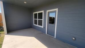 315 Marsh Lane Princeton, TX 75407 - Photo 2 of 20 an empty room with windows