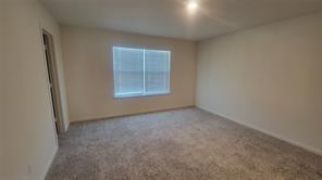 315 Marsh Lane Princeton, TX 75407 - Photo 8 of 20 an empty room with a window
