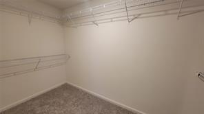 315 Marsh Lane Princeton, TX 75407 - Photo 9 of 20 a view of a room with racks on the wall