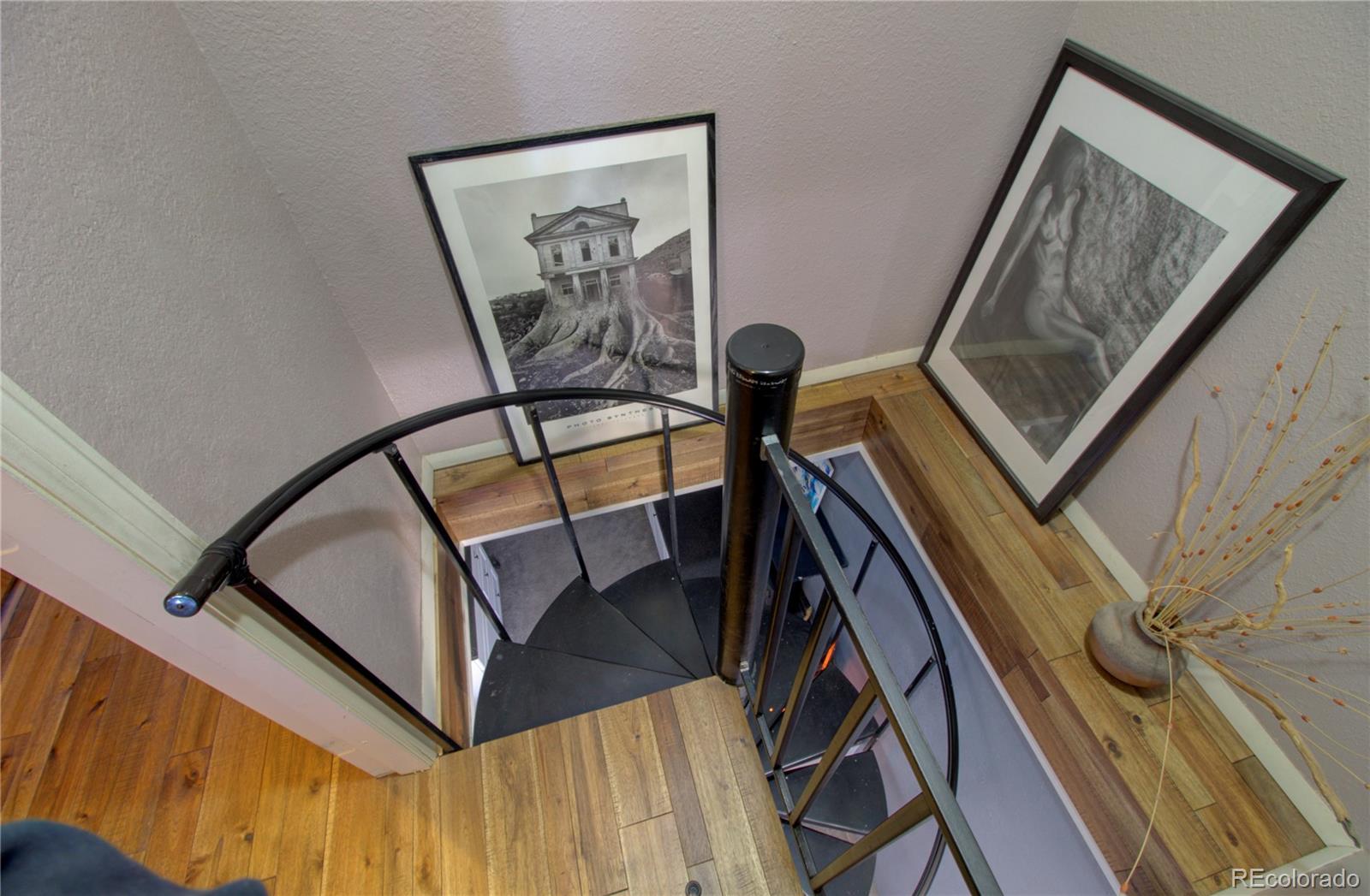 7882 Combs Road Fort Garland, CO 81133 - Photo 18 of 43 a view of staircase with a rug