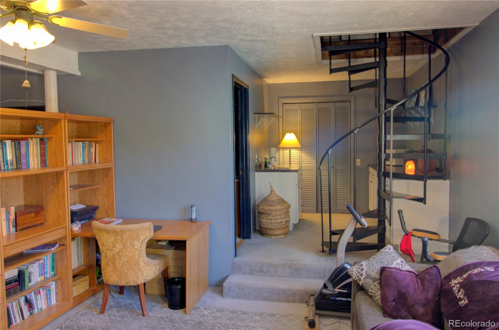 7882 Combs Road Fort Garland, CO 81133 - Photo 20 of 43 a view of a livingroom with furniture and a couch