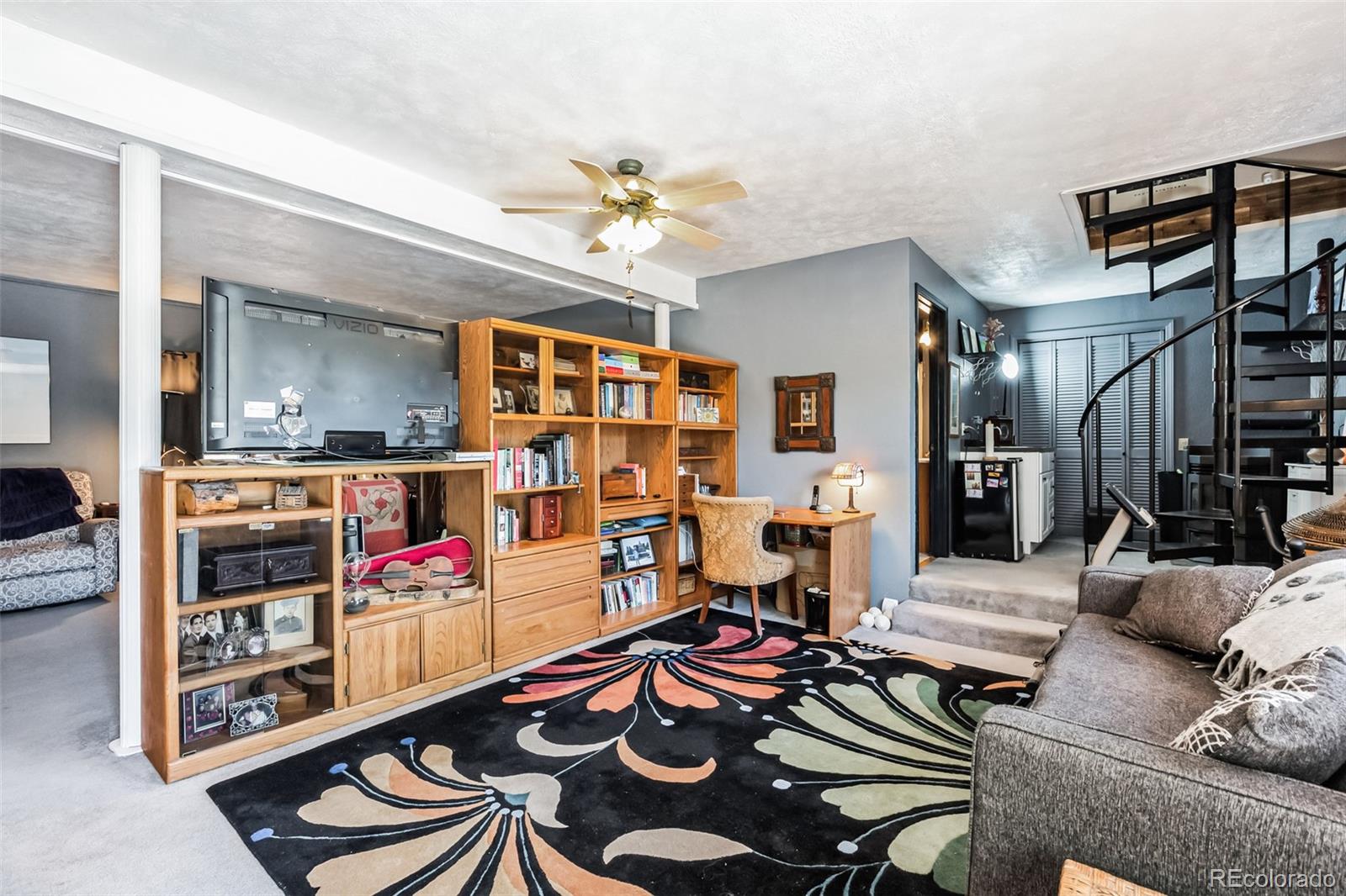 7882 Combs Road Fort Garland, CO 81133 - Photo 22 of 43 a living room with furniture and wooden floor