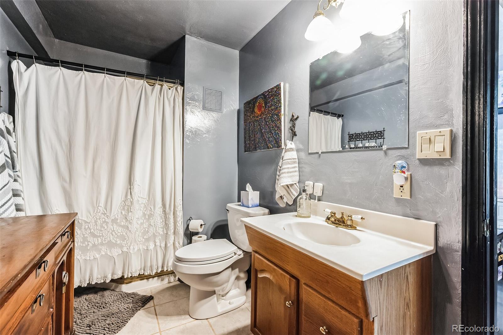 7882 Combs Road Fort Garland, CO 81133 - Photo 30 of 43 a bathroom with a sink toilet and shower