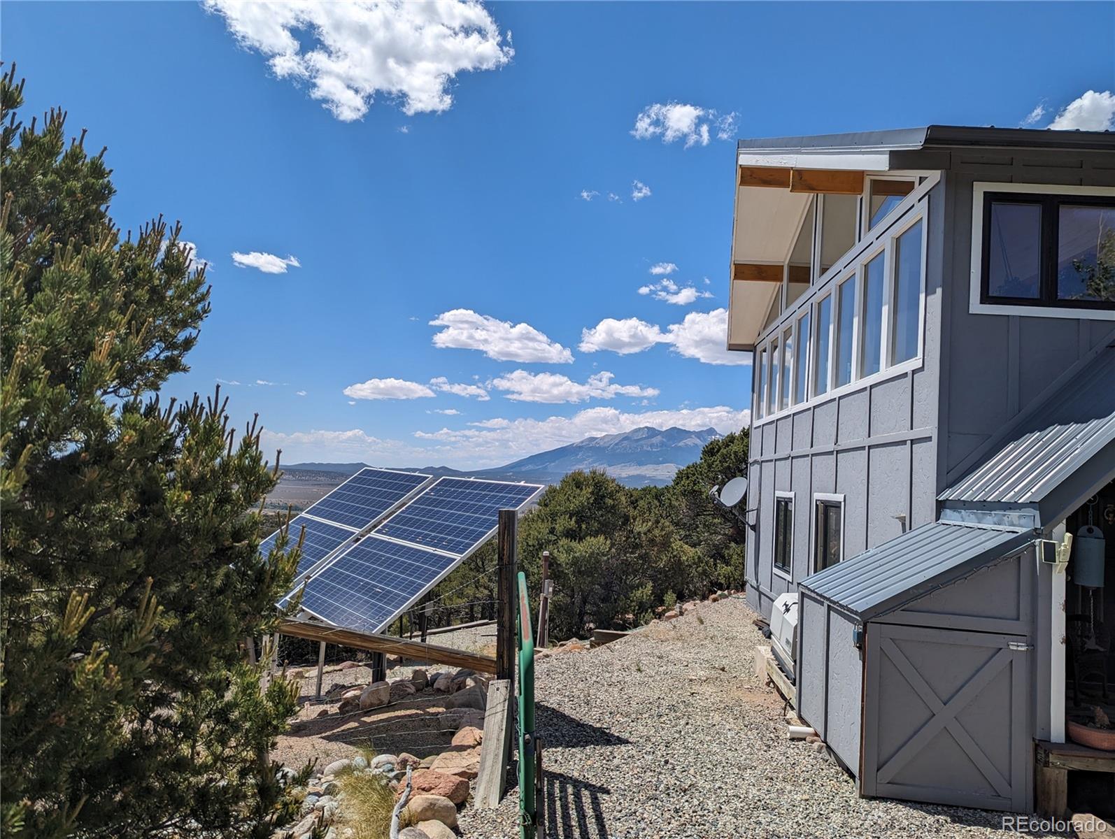 7882 Combs Road Fort Garland, CO 81133 - Photo 3 of 43 a view of a house with a balcony