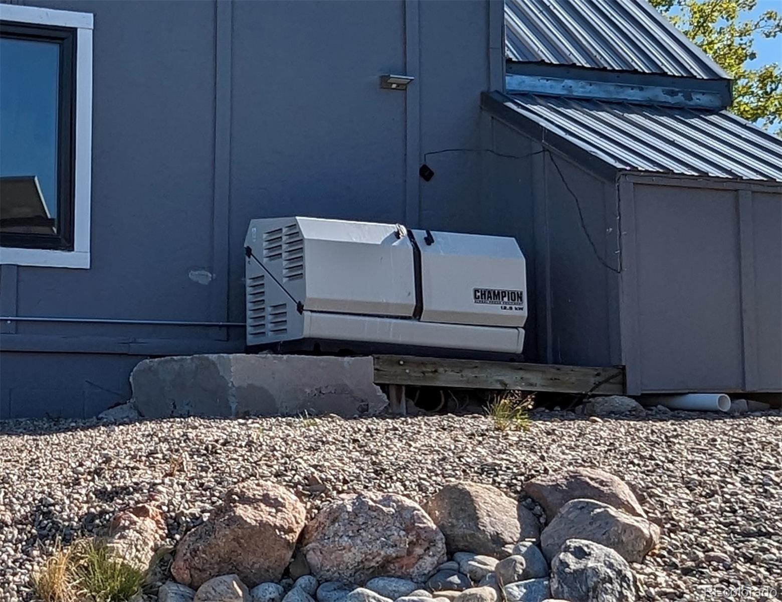 7882 Combs Road Fort Garland, CO 81133 - Photo 36 of 43 a bedroom with a bed and a window