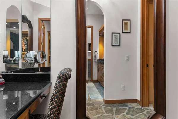 a bedroom with bed and window