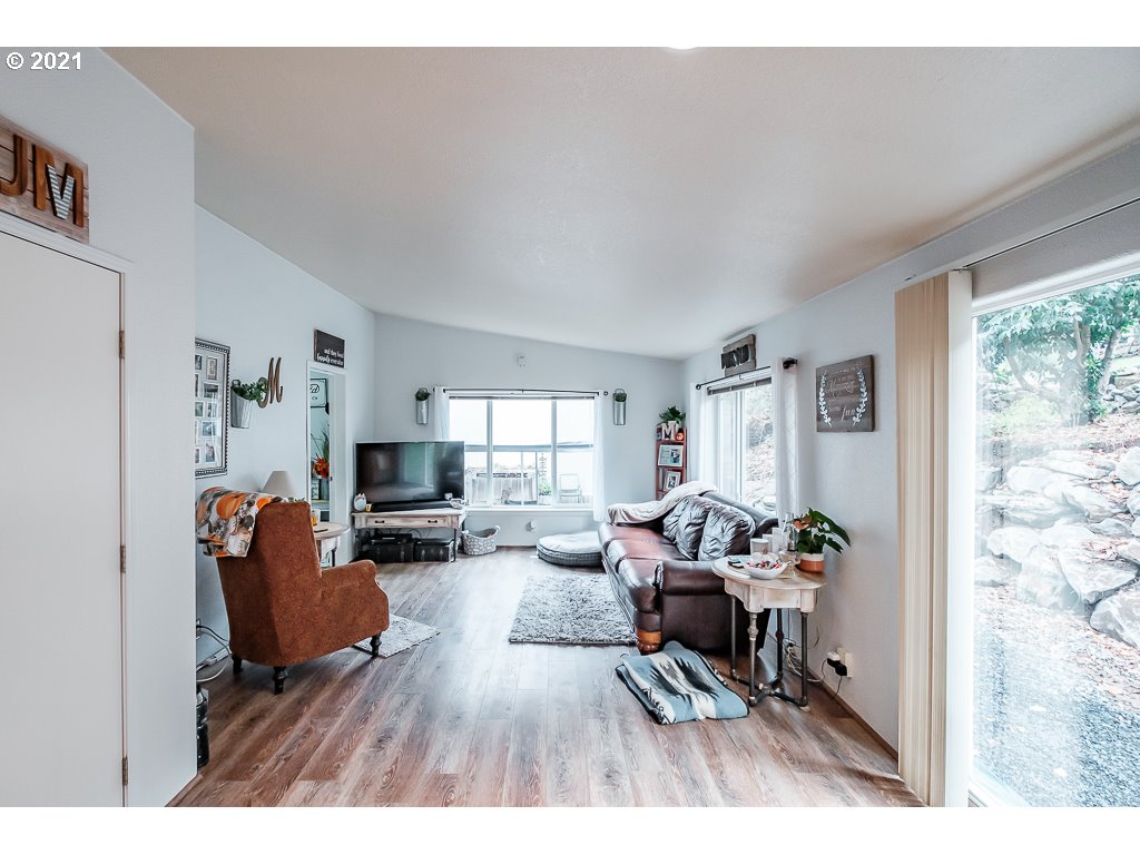 11035 Winstanley Lyons Or 97358 Lyons, OR 97358 - Photo 11 of 31 a living room with furniture and a fireplace