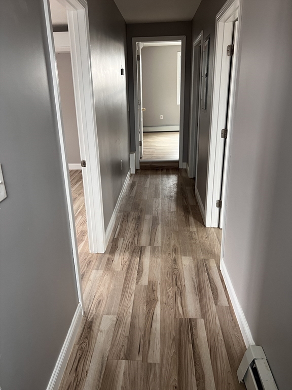 582 Centre Street, Unit 2 Brockton, MA 02302 - Photo 8 of 8 a view of gallery with wooden floor