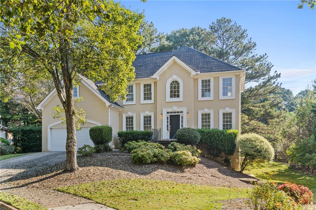 185 Fieldstone Edge Alpharetta, GA 30005 - Photo 1 of 1 a front view of a house with a yard