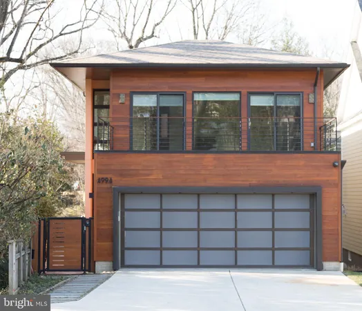 front view of a house with a large window