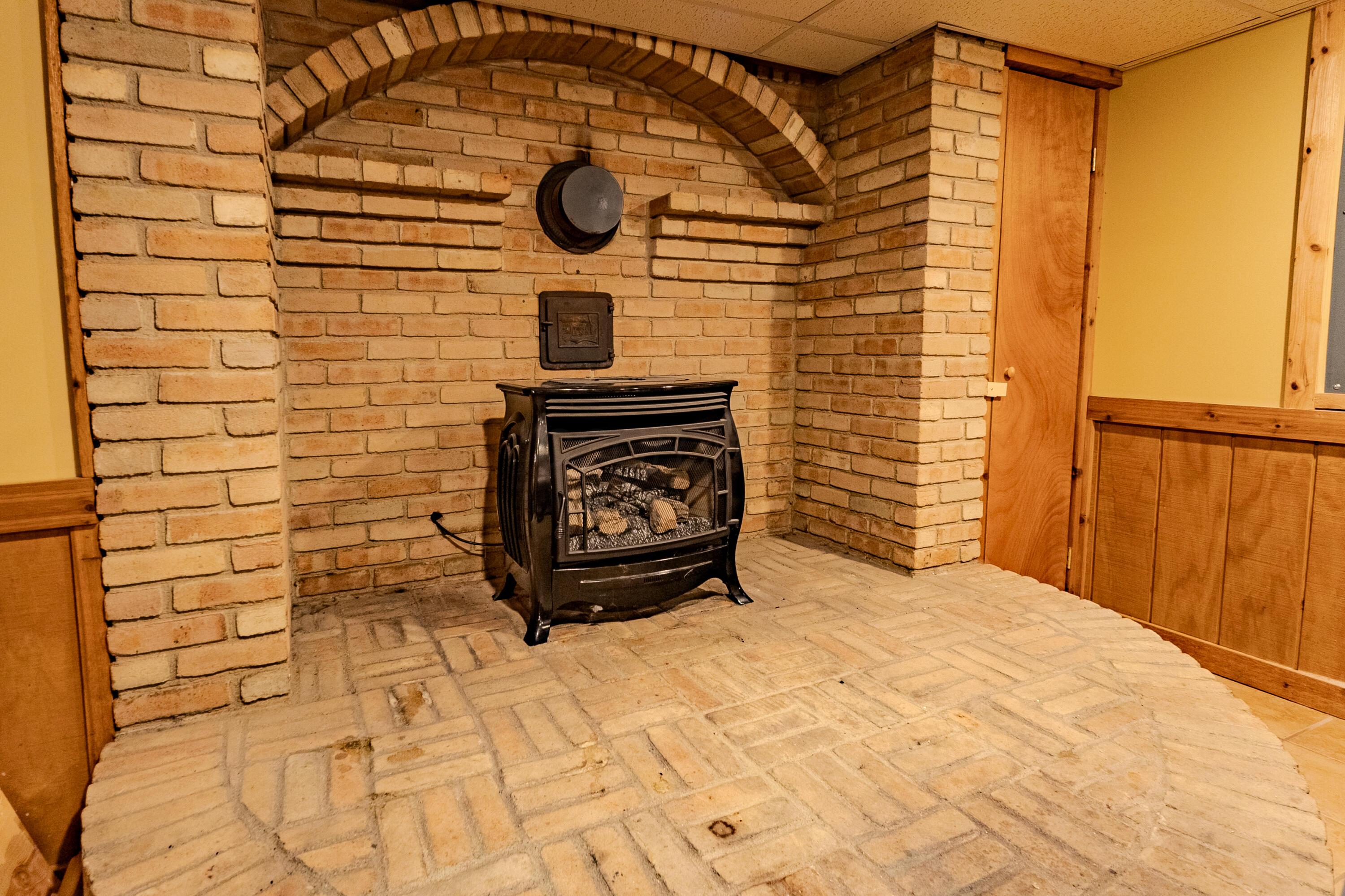 6780 Weldon Road Plain City, OH 43064 - Photo 29 of 34 Lower Level Rec Room Hearth