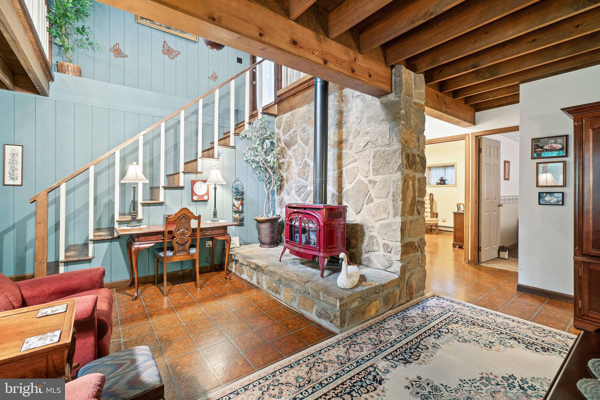 3228 Old Elk Neck Road Elkton, MD 21921 - Photo 22 of 30 open family room with warm cozy gas stove