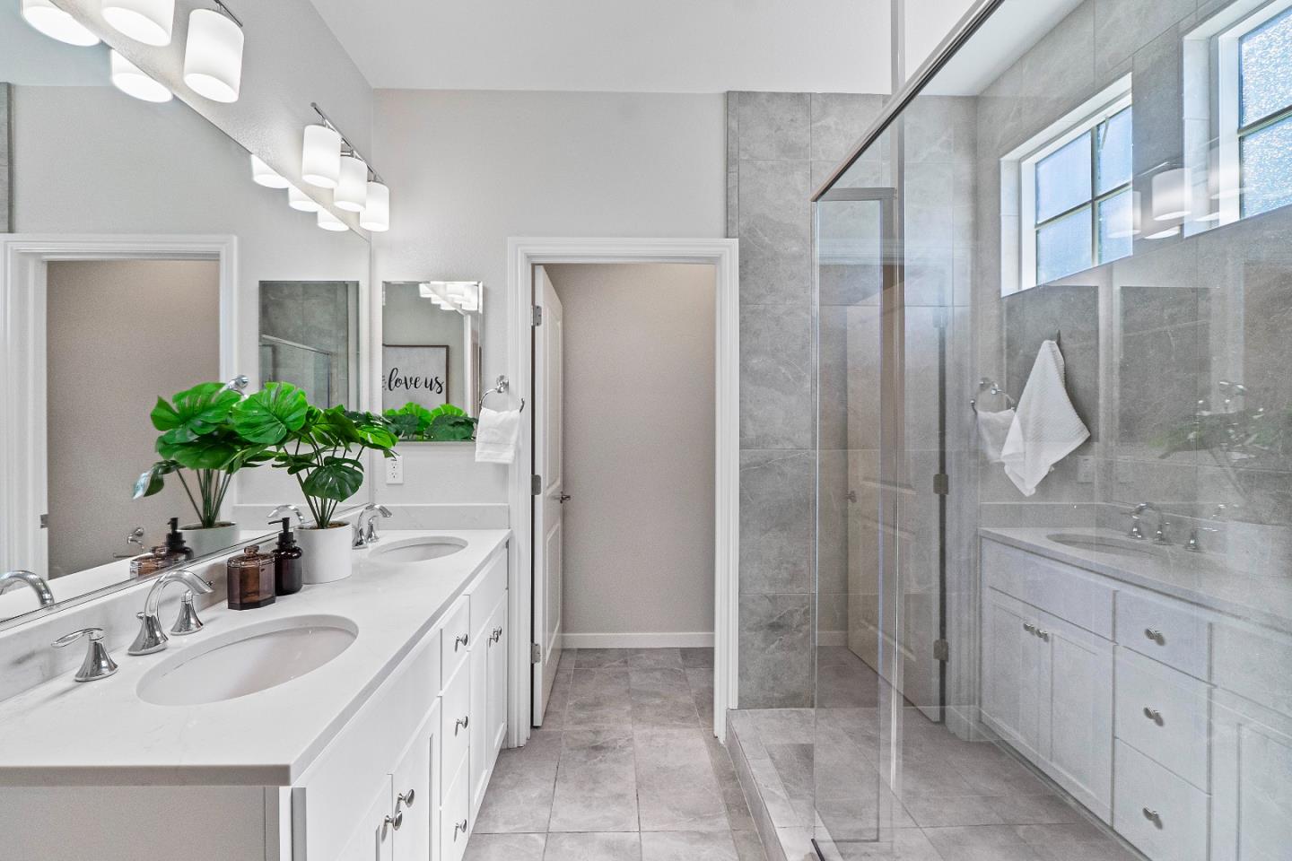 3710 Pyramid Way Mountain View, CA 94043 - Photo 17 of 52 a bathroom with a granite countertop sink a shower and a mirror