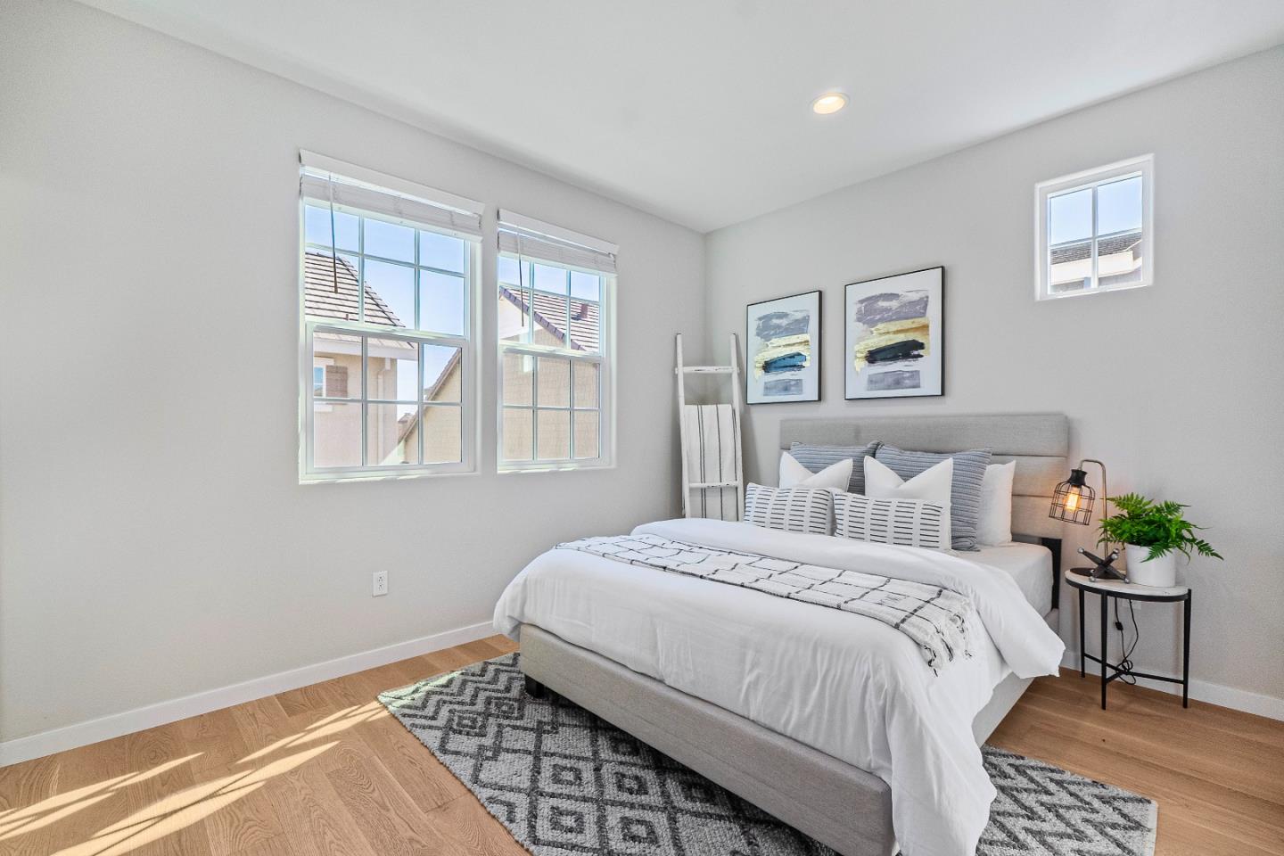 3710 Pyramid Way Mountain View, CA 94043 - Photo 20 of 52 a bedroom with a bed potted plant and a window
