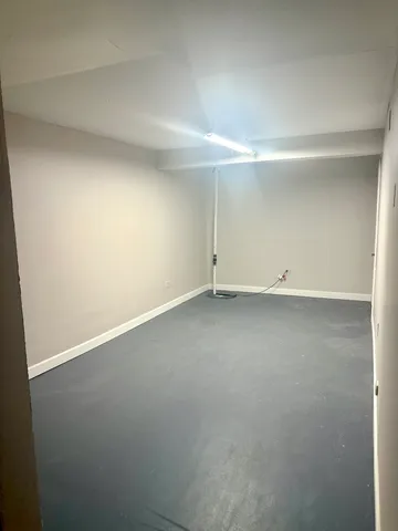 an empty room with a natural light