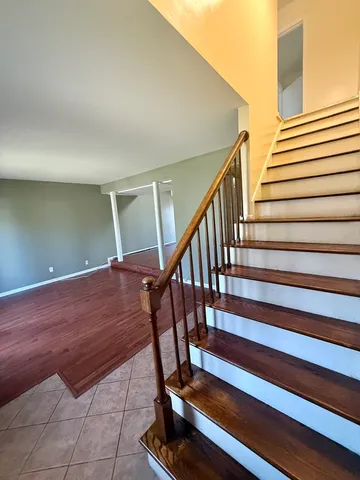 a view of entryway with wooden floor
