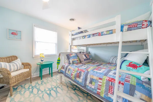 a bedroom with a bed and a couch