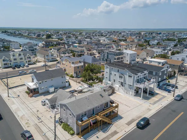 an aerial view of a building with parking space
