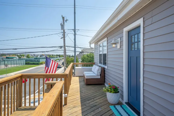 a balcony with furniture
