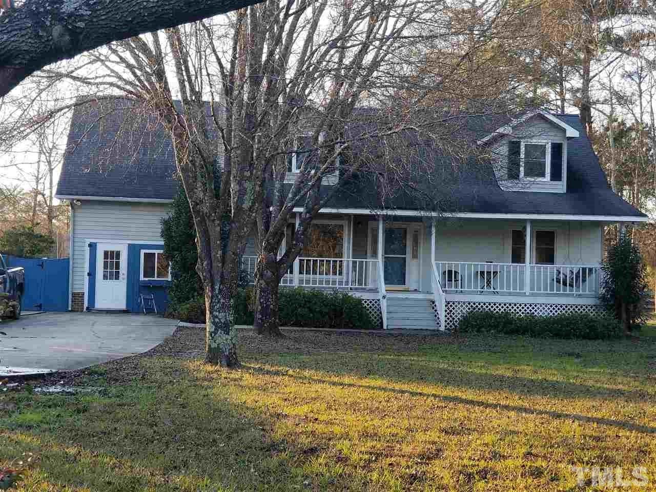 2300 Rolesville Road Wake Forest, NC 27587 - Photo 1 of 24 a front view of a house with a yard