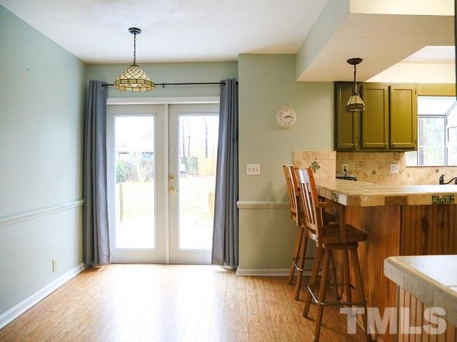 2300 Rolesville Road Wake Forest, NC 27587 - Photo 14 of 24 a view of a dining room with furniture and window