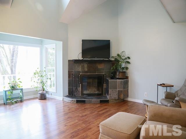 2300 Rolesville Road Wake Forest, NC 27587 - Photo 4 of 24 a living room with furniture and a fireplace