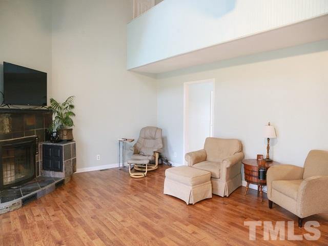 2300 Rolesville Road Wake Forest, NC 27587 - Photo 6 of 24 a living room with furniture and a flat screen tv