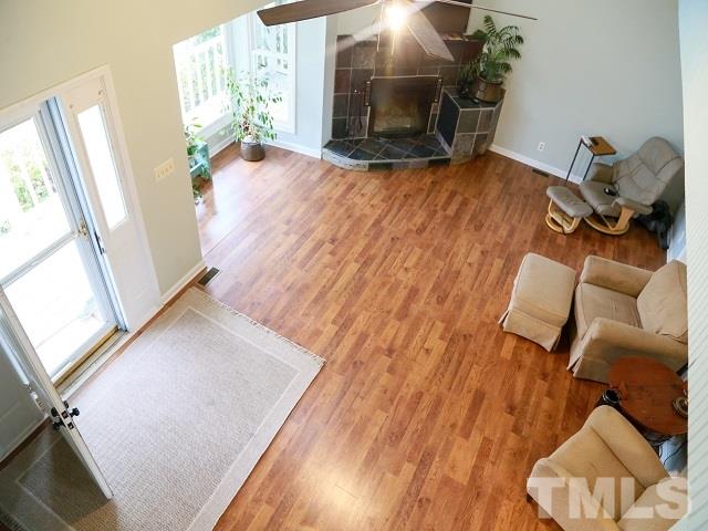 2300 Rolesville Road Wake Forest, NC 27587 - Photo 8 of 24 a living room with furniture and a fireplace