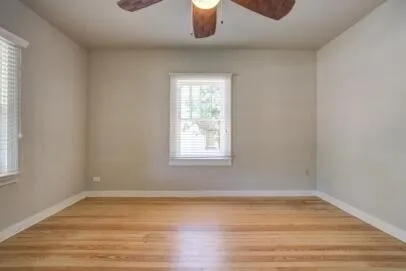 a room with window and wooden floor