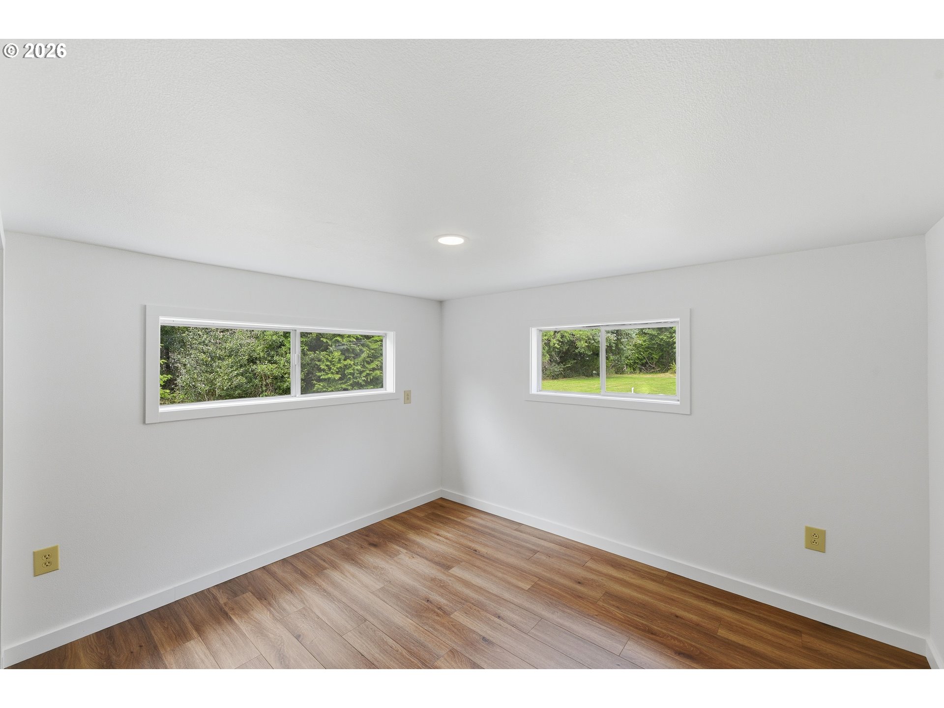 63299 Wildahl Road Coos Bay, OR 97420 - Photo 27 of 45 a view of an empty room with a window