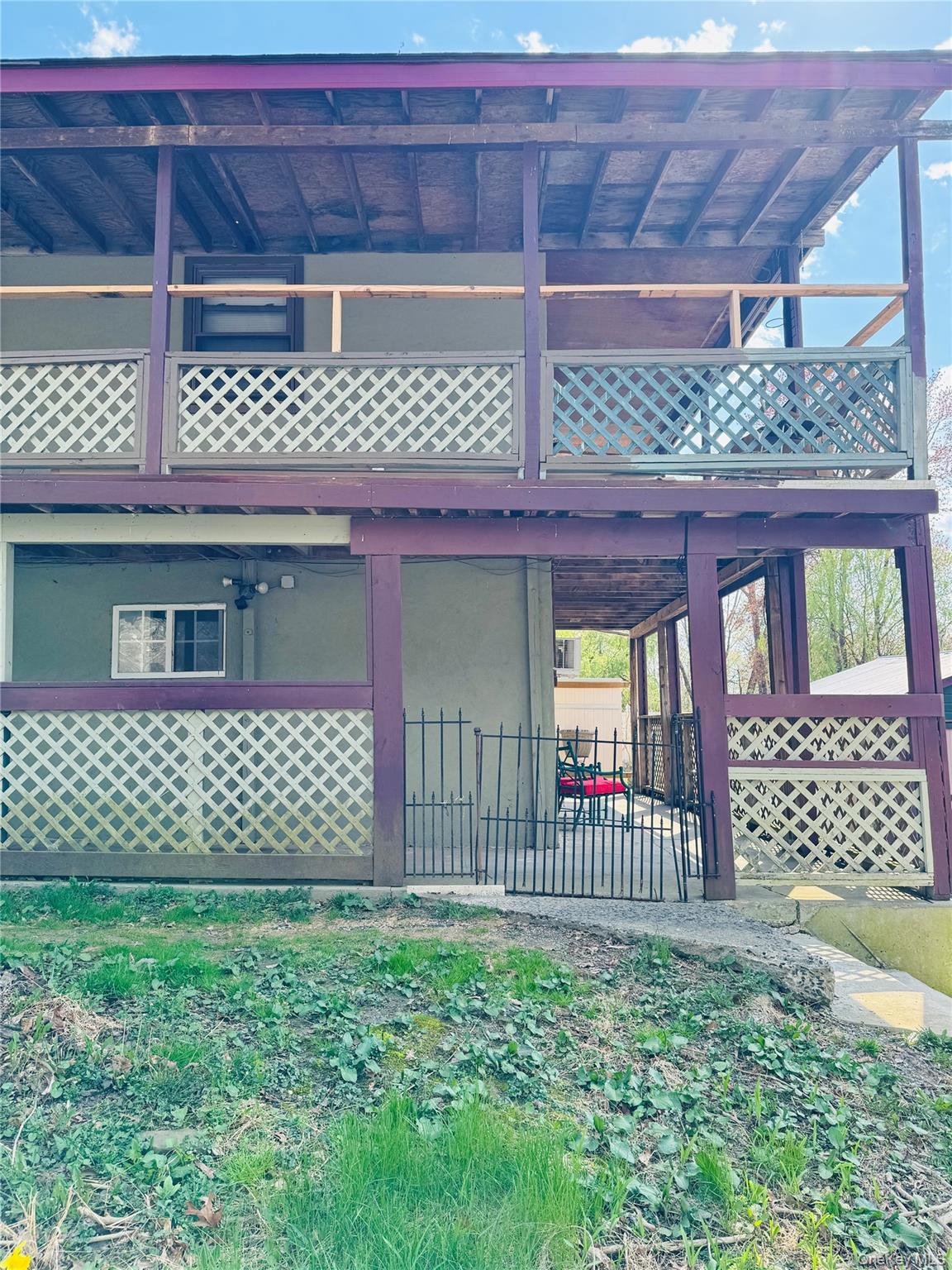 152 Forest Glen Road, Unit 4 New Paltz, NY 12561 - Photo 10 of 12 a front view of a house with a fence