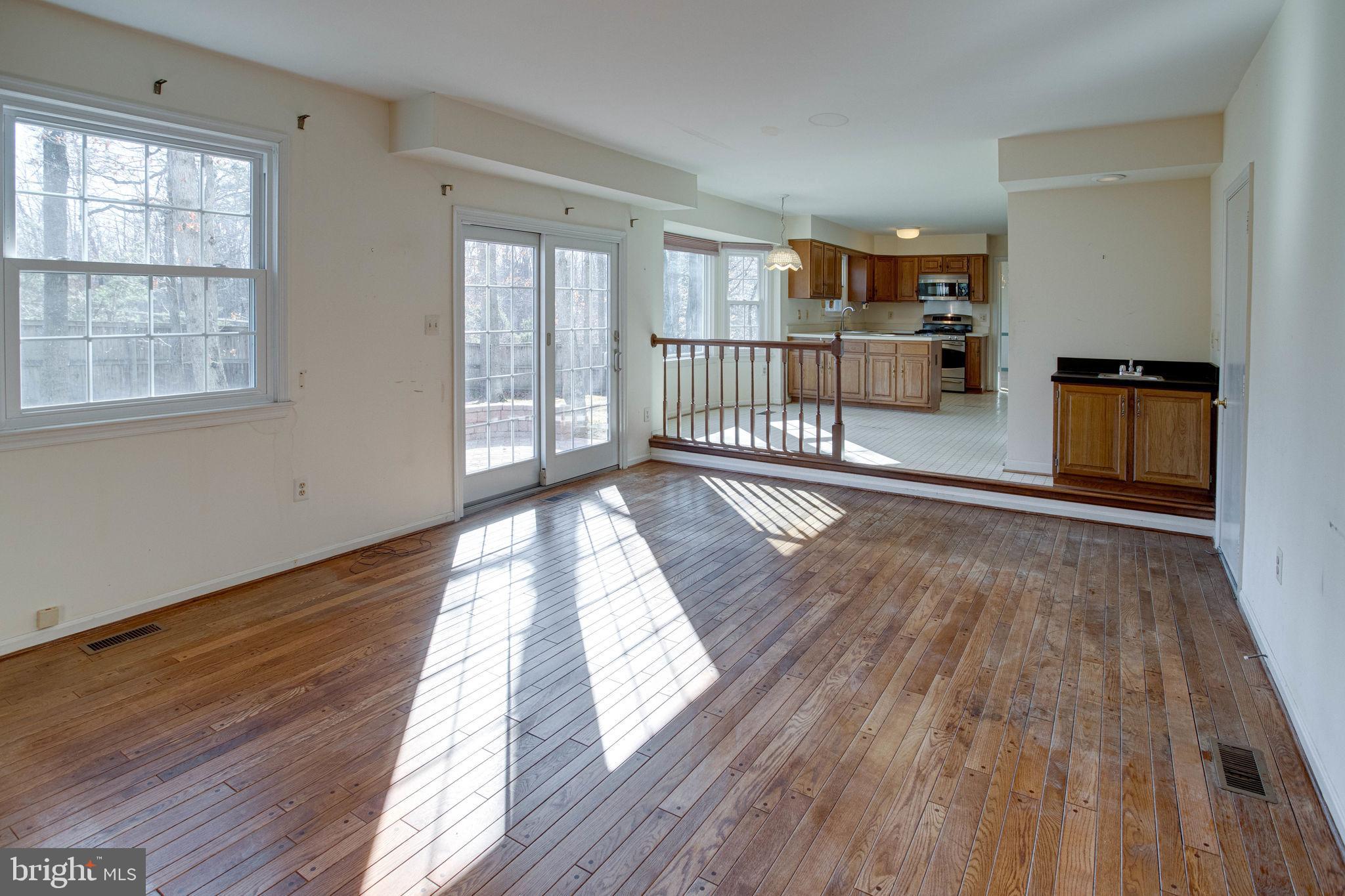 10128 Red Spruce Road Fairfax, VA 22032 - Photo 22 of 48 Fam Rm with Hardwood Floors Step out to Patio