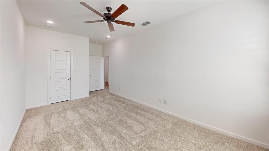 285 Buck Ridge Drive Little Elm, TX 75068 - Photo 16 of 20 a view of a big room with carpet