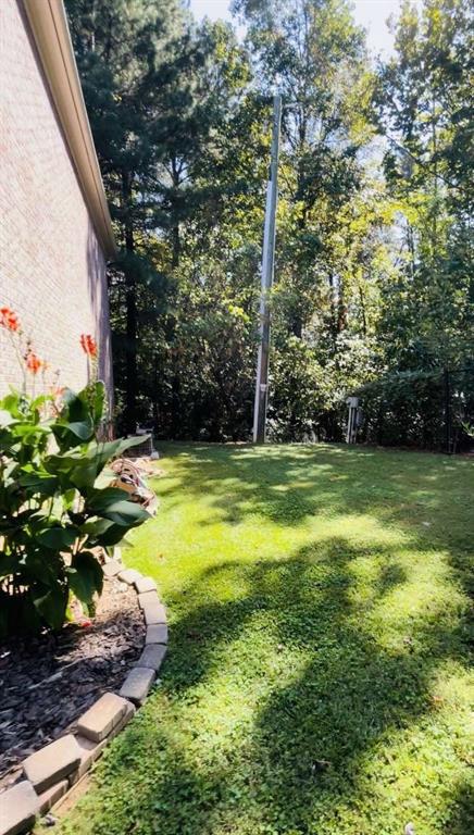 105 Beracah Walk Atlanta, GA 30331 - Photo 15 of 17 a view of a yard with plants