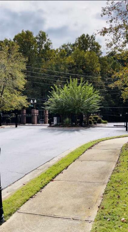 105 Beracah Walk Atlanta, GA 30331 - Photo 17 of 17 a view of swimming pool with lawn chairs under an umbrella