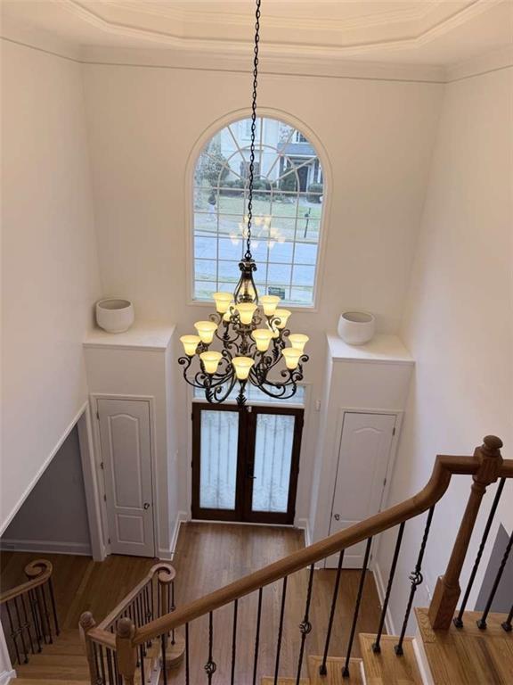 105 Beracah Walk Atlanta, GA 30331 - Photo 2 of 17 a vase of flowers sitting on a table with wooden floor