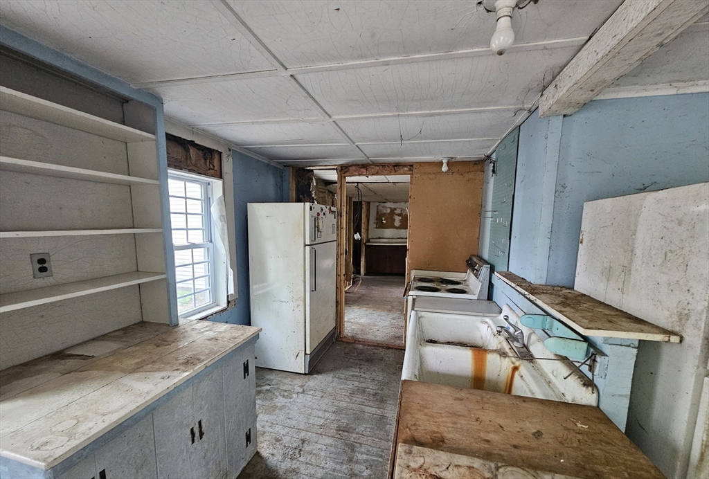 1 Crane Road Chester, MA 01011 - Photo 5 of 12 a view of kitchen with refrigerator and window