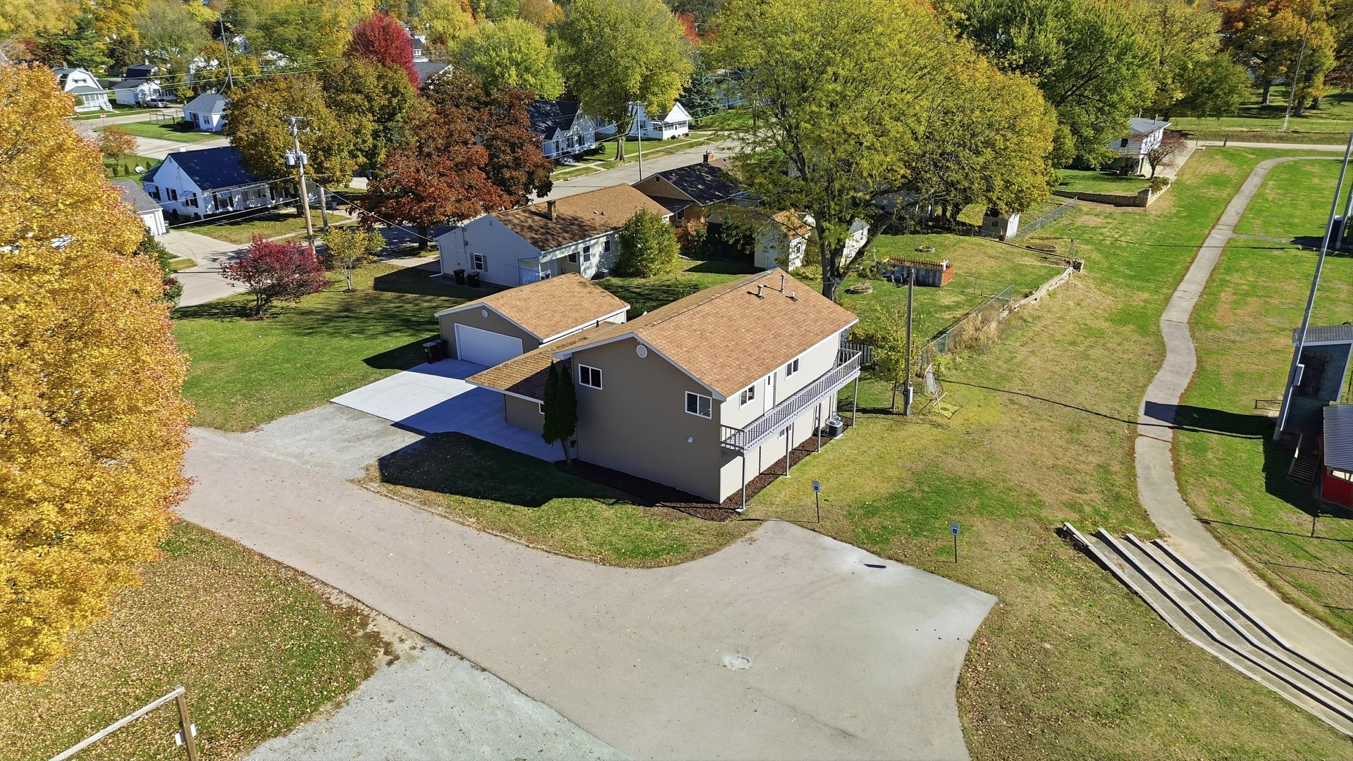 503 West Winfield Street Morrison, IL 61270 - Photo 18 of 22 an aerial view of a house with a yard basket ball court and outdoor seating