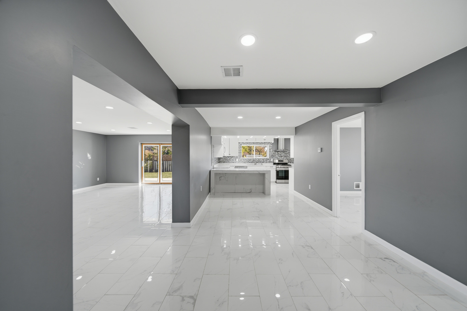 503 West Winfield Street Morrison, IL 61270 - Photo 2 of 22 a view of a hallway with kitchen and sink