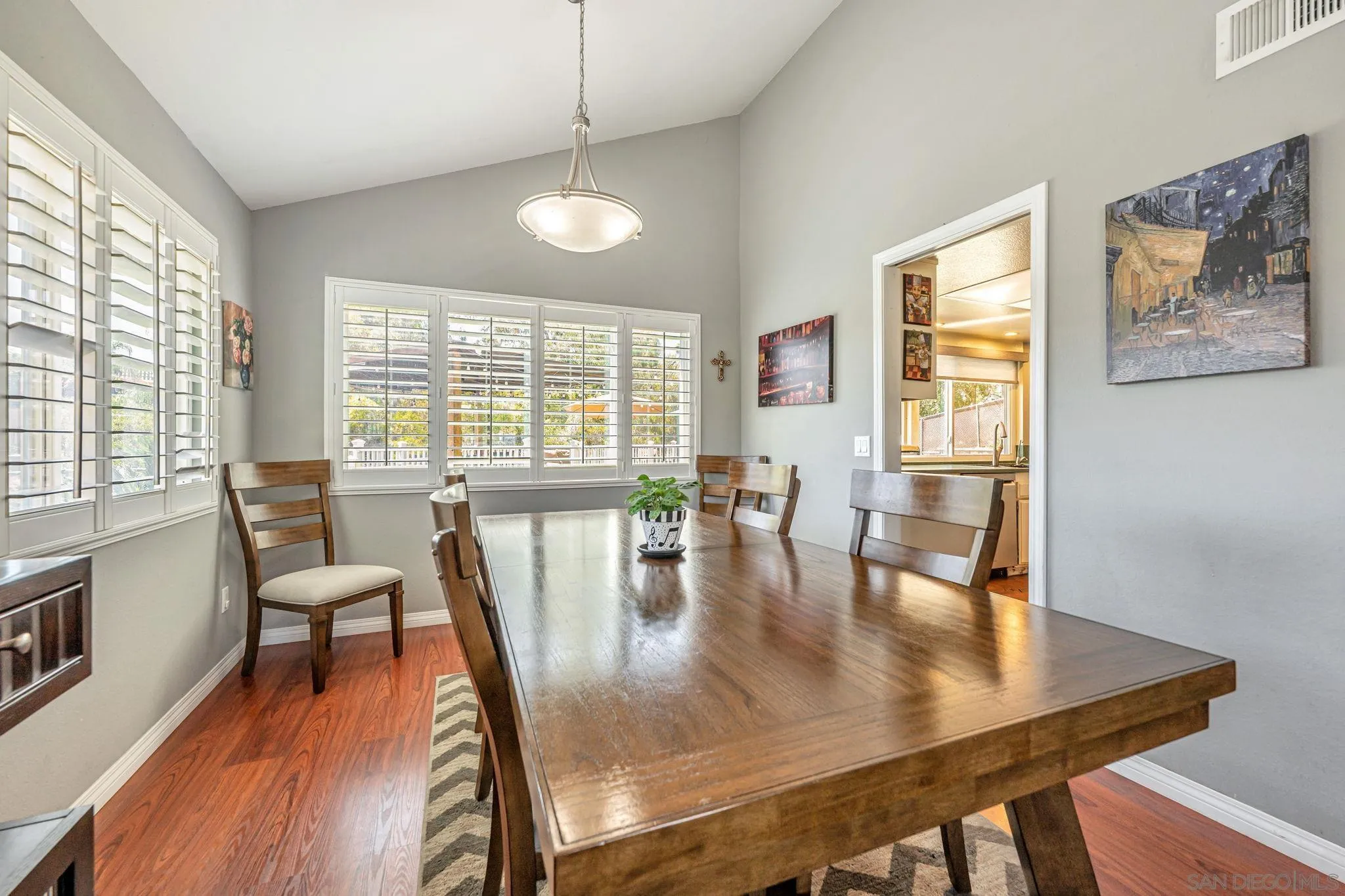 3304 Del Charro Road Jamul, CA 91935 - Photo 13 of 44 a view of a dining room with furniture window and wooden floor
