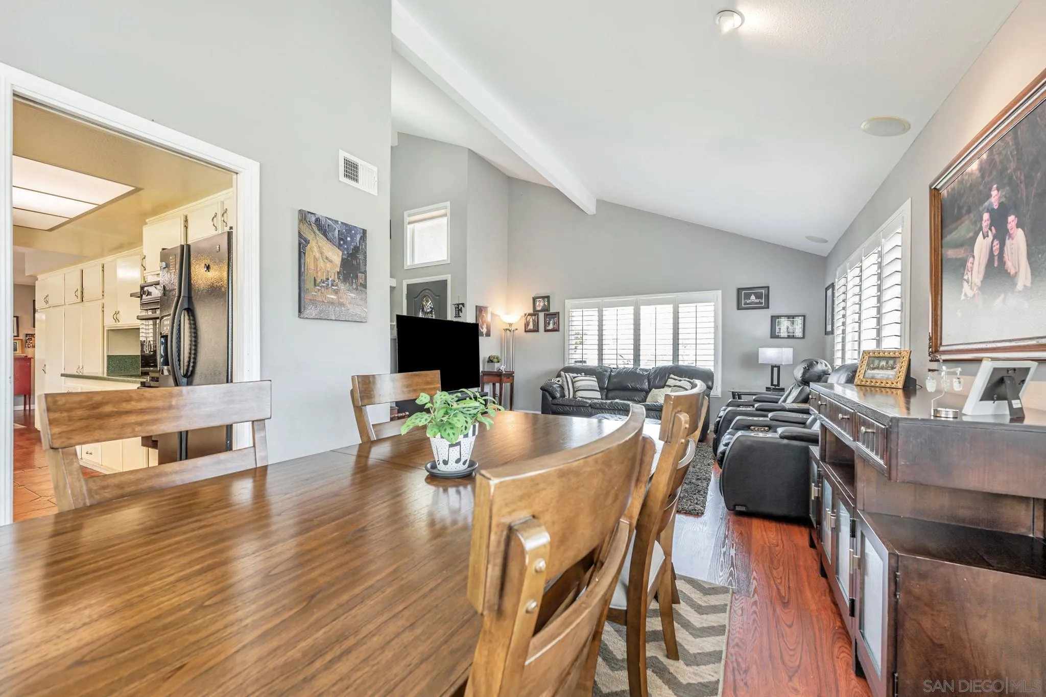 3304 Del Charro Road Jamul, CA 91935 - Photo 14 of 44 a view of a dining room with furniture and wooden floor