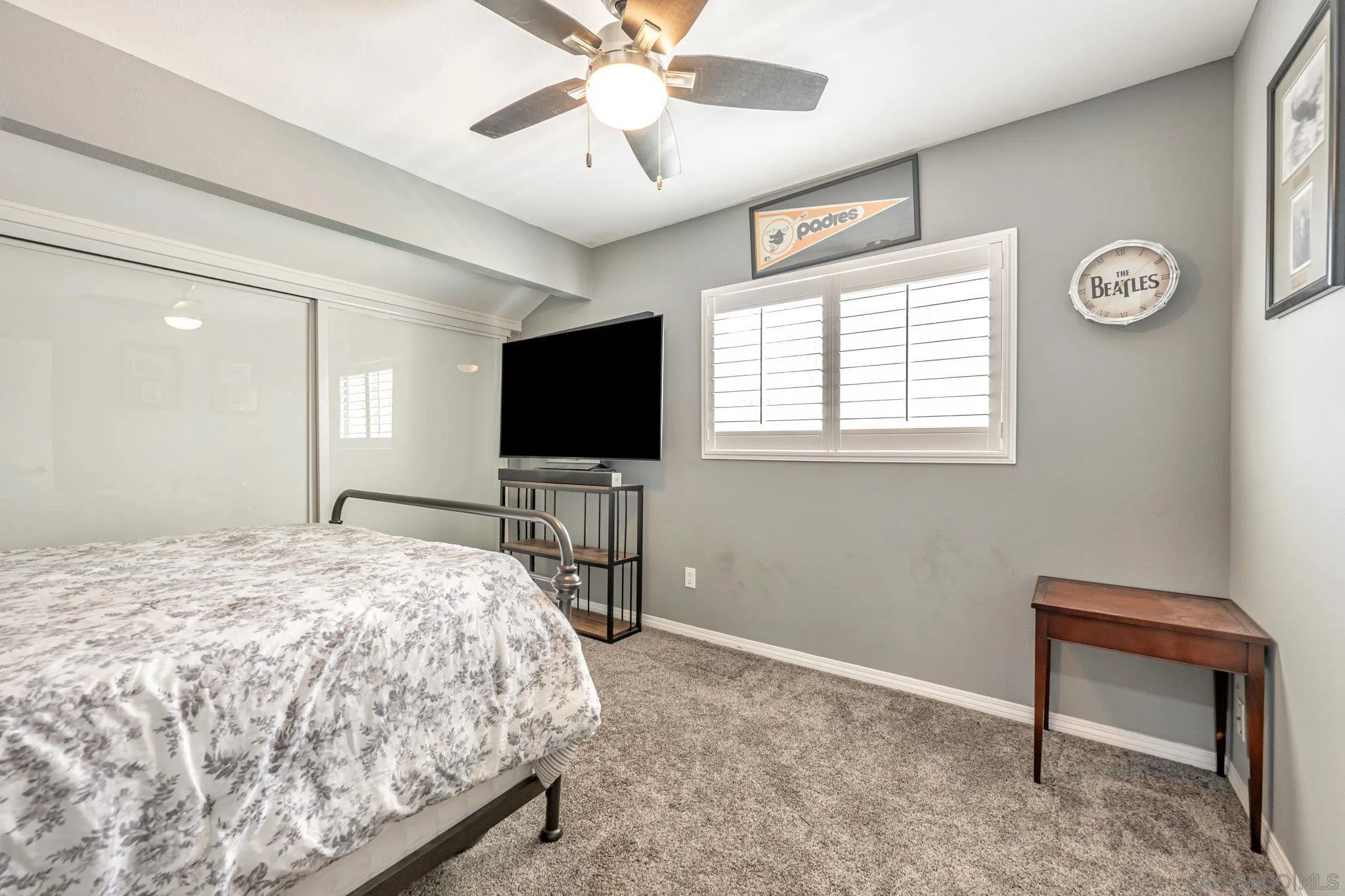 3304 Del Charro Road Jamul, CA 91935 - Photo 19 of 44 a bedroom with a bed and a flat screen tv