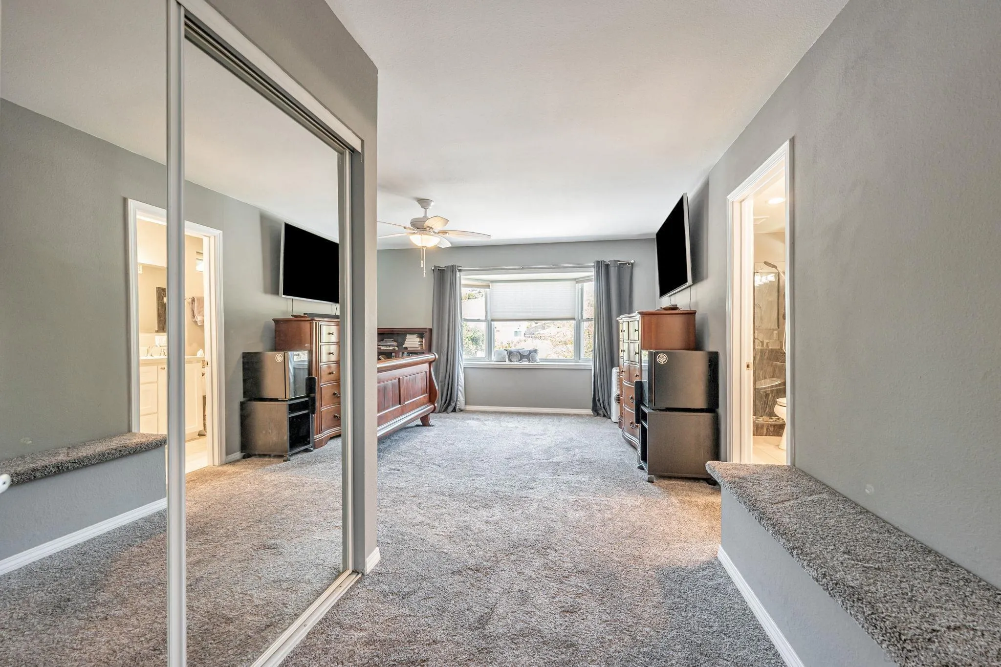 3304 Del Charro Road Jamul, CA 91935 - Photo 23 of 44 a view of a livingroom with furniture and a flat screen tv