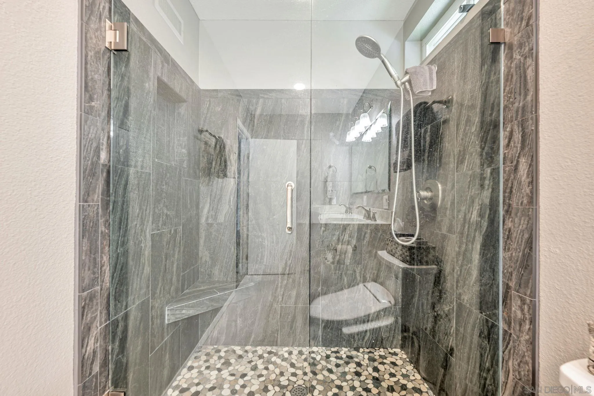 3304 Del Charro Road Jamul, CA 91935 - Photo 31 of 44 a bathroom with a shower and a toilet