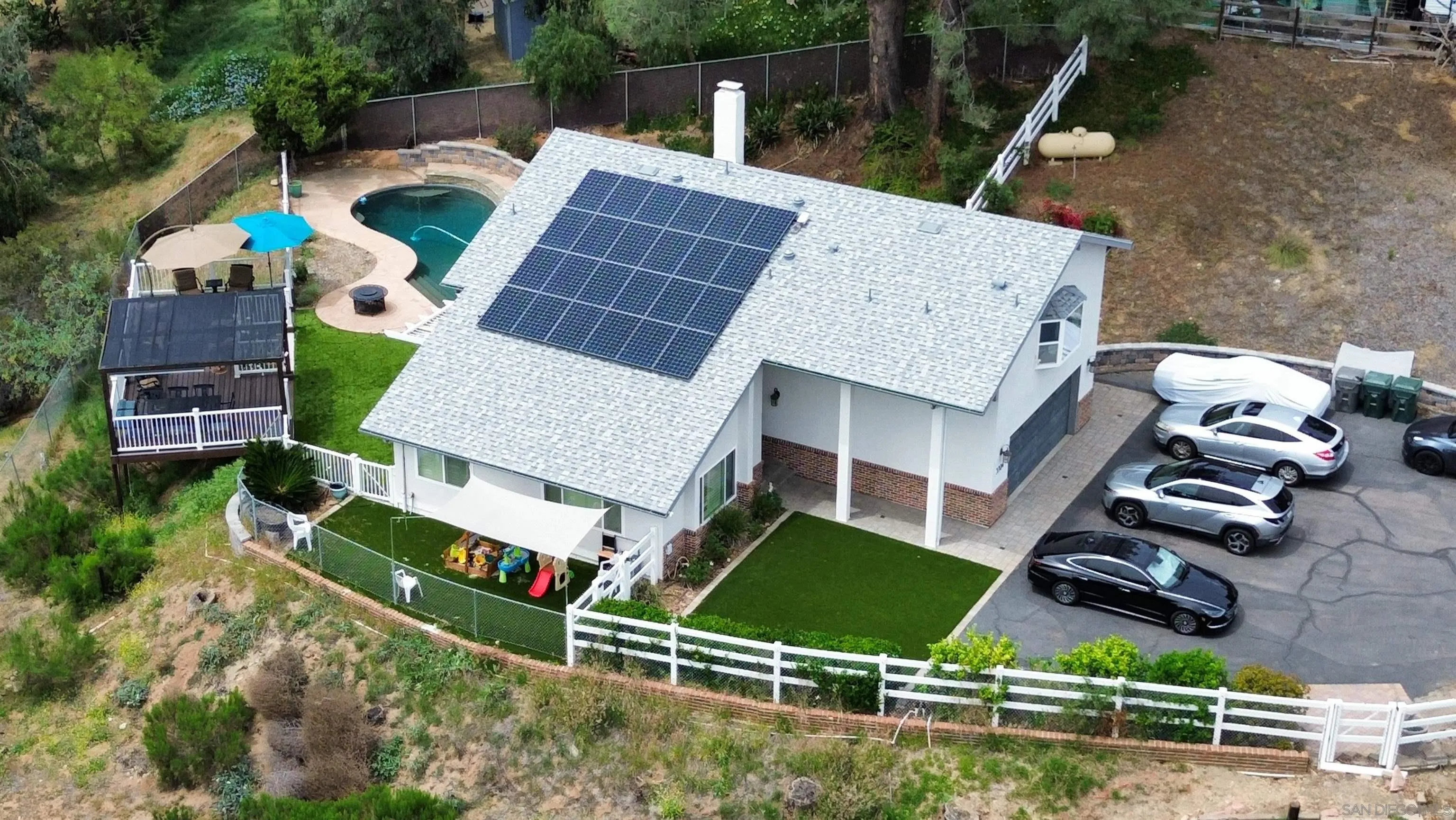 3304 Del Charro Road Jamul, CA 91935 - Photo 41 of 44 an aerial view of house with a yard