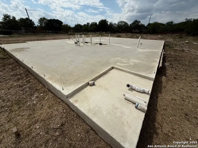 a view of swimming pool with a lake view