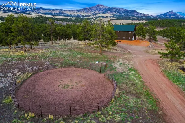 a view of a backyard with a garden