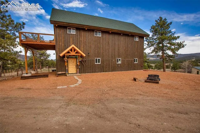 a view of swimming pool with a bench in front of it