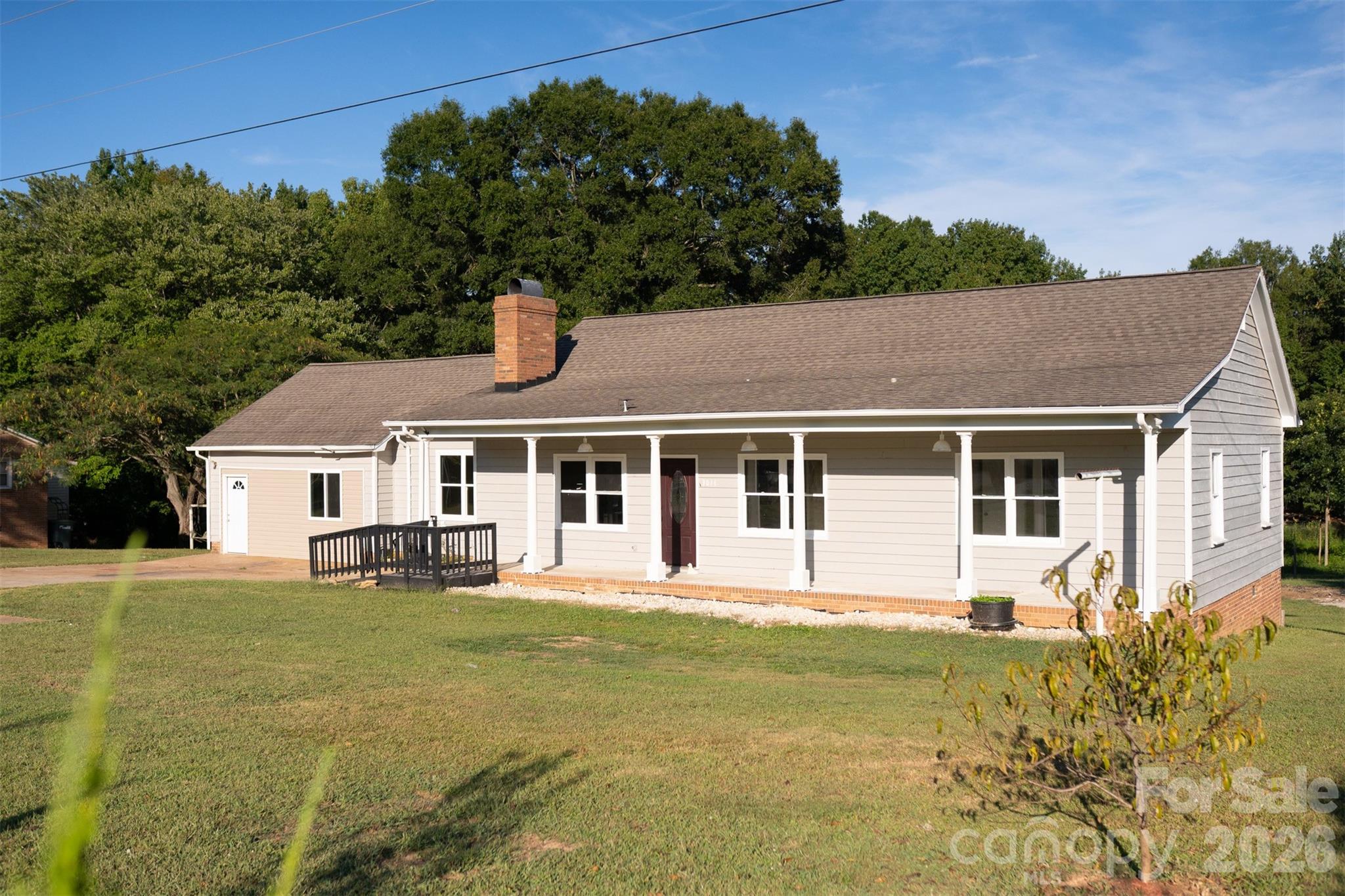 front view of a house with a yard