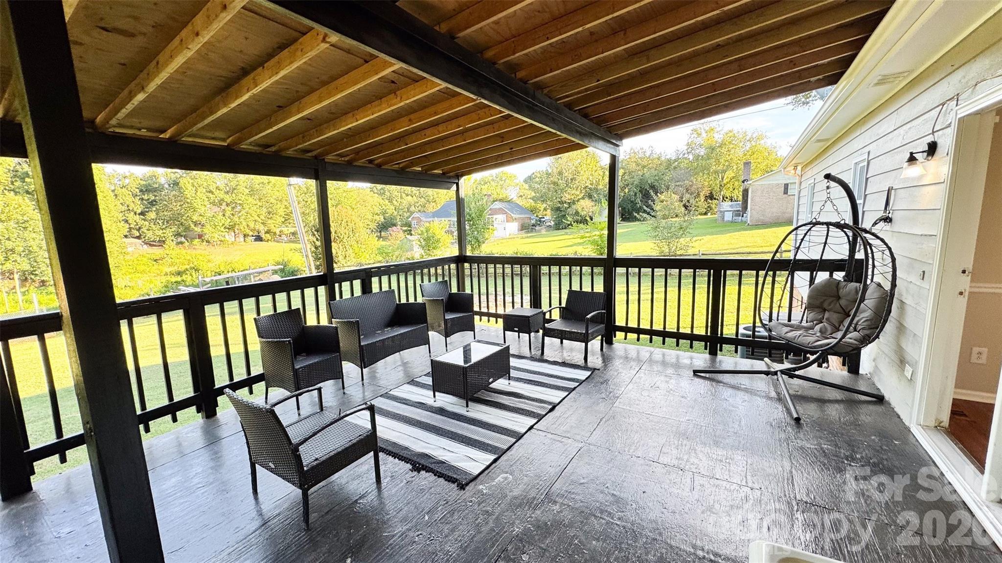 3014 Morgan Mill Road Monroe, NC 28110 - Photo 6 of 26 a view of a two chairs in the roof deck